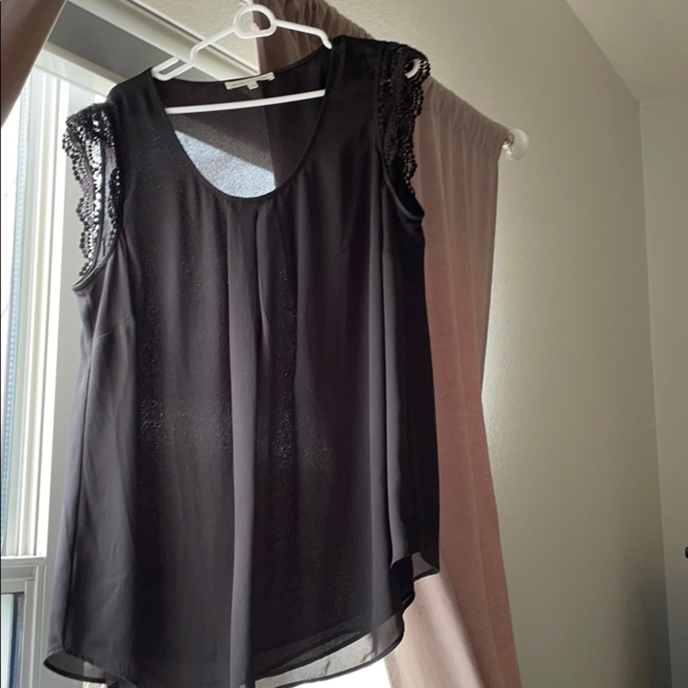 Black blouse with cut out detail on sleeves